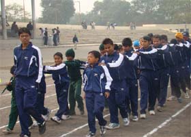 Students taking part in the march past on the opening day of the sports festival-cum-competition for disabled children in Faridkot on Tuesday