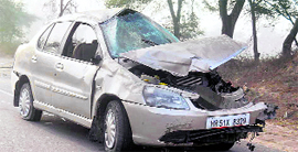 The car that overturned near Odhan in Sirsa on Tuesday, killing a couple and injuring two persons.