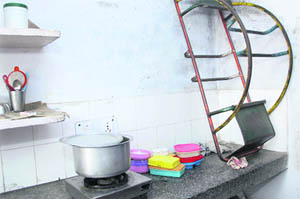 a seesaw dumped in a kitchen