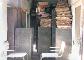 Obstructions have narrowed the corridor on the first floor