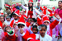 Tiny tots of Radiant Kids Playway School celebrate Christmas in Bathinda on Wednesday.