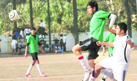 Players in action during a football match at Sector 38, Chandigasrh, on Wednesday. 