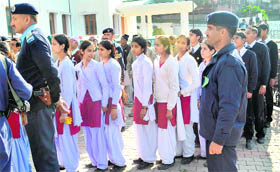 Schoolchildren stand in a queue to enter the Vidhan Sabha to watch its proceedings in Dharamsala on Wednesday.