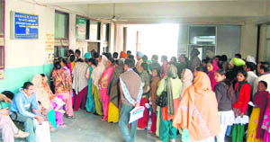 Long queues of patients outside the scanning unit of the Civil Hospital in Jalandhar on Wednesday. 