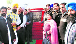LIT chairman MM Vyas along with Minister of Health and Faimly Welfare Satpal Gosain lays the foundation stone of a housing project in Ludhiana on wednesday