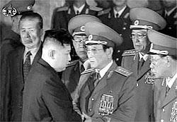 Kim Jong-un shakes hands with generals after paying his respects to his father Kim Jong-il, lying in state at the Kumsusan Memorial Palace in Pyongyang