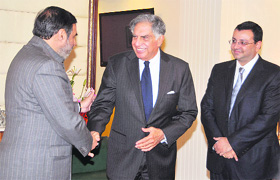 Tata Sons chairman Ratan Tata (C) and deputy chairman Cyrus Mistry (R) with Commerce Minister Anand Sharma during a meeting in New Delhi on Thursday. Mistry is expected to take over from Tata when he retires next year