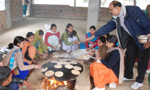 Volunteers prepare food during the NSS camp at Government Rajindra College in Bathinda. 