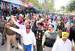 BJP workers protest against the role of officials and politicians in the booth scam in Chandigarh