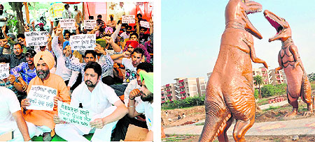 Workers stage a protest over the scam in the recruitment of CTU bus conductors in Chandigarh
