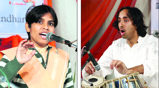 Vocalist Promila Dev and tabla player Karanjit Singh perform during the Harivallabh pratiyogita at the Devi Talab Mandir in Jalandhar. 