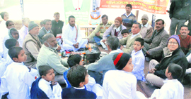 People pay tributes to former Prime Minister Chaudhary Charan Singh on his 109th birth anniversary in Haridwar on Friday.