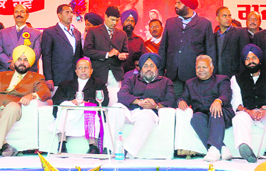 Deputy Chief Minister Sukhbir Badal, MP Navjot Singh Sidhu and other leaders at a rally in Majitha. 