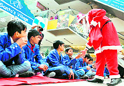 Underprivileged children celebrate Christmas in Gurgaon on Saturday