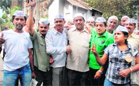 Supporters of anti-corruption activist Anna Hazare in Mumbai