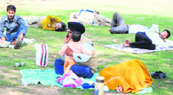 Patients and their relatives outside a hospital in Chandigarh.