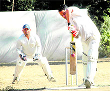 A batsman hits the ball in the Twenty20 Beehive Challengers Cup Cricket Tournament played at the Matawalabagh in Dehradun on Sunday