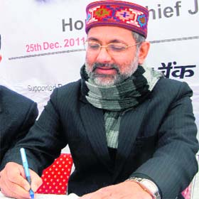 Chief Justice Kurian Joseph signs a declaration form of eye donation in Shimla on Sunday