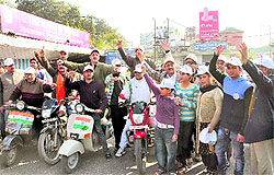 Members of the Panun Kashmir participate in a rally to mark Homeland Day in Jammu on Sunday