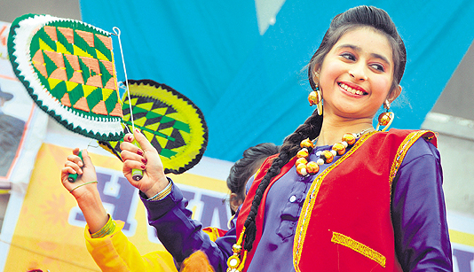 A girl performs dance during a fete at HVM School, Ludhiana.