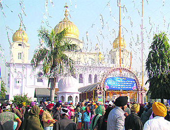 Devotees throng the historic Fatehgarh Sahib gurdwara to pay obeisance on Sunday.