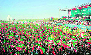 Supporters of Imran Khan gather for a public meeting in Karachi on Sunday