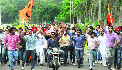 Members of SOPU take out a rally after winning student council elections in Chandigarh.