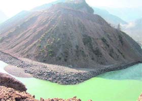 Waste material which has been dumped into the Bhagirathi river near the Koteshwar dam