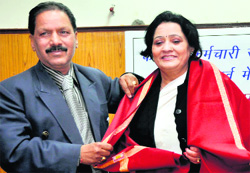 Former Dehradun Mayor Manorama Sharma Dobriyal being felicitated at a function in Dehradun on Monday.