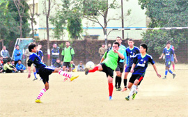 Players in action in a match in the 44th Amar Shaheed Kharag Bahadur Bisht Memorial Football Tournament in Dehradun on Monday