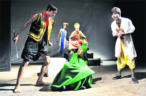 Artistes perform in a play Parrots Training directed by Kedar Thakur at the Gaiety Theatre in Shimla on Monday. 