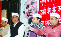 Members of the India Against Corruption address mediapersons in Amritsar on Monday. 