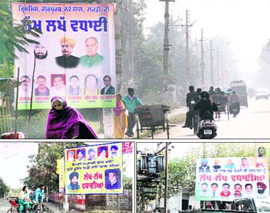 Hoardings of the Congress and the SAD put up at the Urban Estate, Phase-I, in violation of the election code