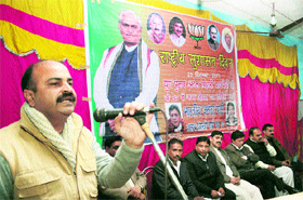 Yudhvir Sethi, state secretary of the BJP, addresses a gathering during a function to celebrate the birthday of former Prime Minister Atal Behari Vajpayee at Talab Tillo in Jammu on Monday. 