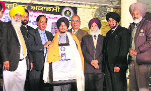 Malwa Rang Manch Punjab honours Santokh Singh Sukha in Ludhiana.