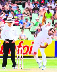 South Africas Imran Tahir delivers a ball during the first day of the second Test against Sri Lanka at the Kingsmead Stadium in Durban on Monday