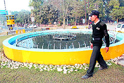 A private security guard keeps vigil at the fountain near the Rose Garden in Bathinda. Theft had taken place two months ago and the miscreants had decamped with the nozzles that spray water in the fountain. Provision has been made for two security guards at the fountain who guard it round-the-clock