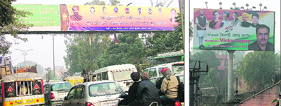 A political hoarding put up over an overhead signboard near the Bharat Nagar Chowk in Ludhiana on Tuesday