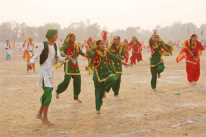 Students of Army Public School present a dance performance during the annual sports day celebration on Monday. 