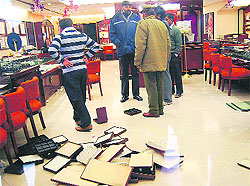 Top police officers inpect the Tanishq showroom at Mani Majra where Chandigarhs biggest robbery took place