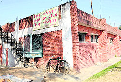 A night shelter near a parking area for trucks at the grain market in Sector 26 of Chandigarh