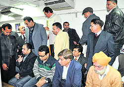 With visitors gallery packed to its brim, Harmohan Dhawan (in white jacket) and many others were forced to stand on chairs to witness the swearing-in ceremony of the new MC team in Sector 17, Chandigarh, on Wednesday