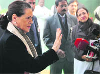 Sonia Gandhi talks to mediapersons at the Congress headquarters on the foundation day of the Indian National Congress, in New Delhi on Wednesday. 