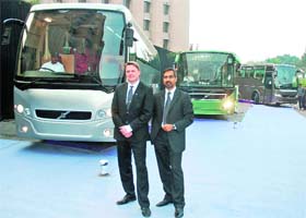 Volvo Bus Corp president Hakan Karlsson (L) and Akash Passey, MD & CEO, Volvo Buses in South Asia, pose with the companys new range of vehicles  the Volvo 9400PX Multi-axle bus, 7400XL City Bus and 9100 Coach  at their launch in New Delhi on Thursday