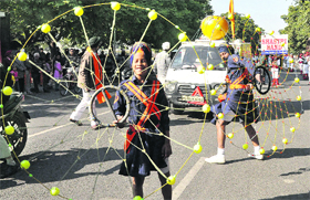 Devotees perform gatka during the nagar kirtan procession, ahead of Gurpurb which falls on Saturday, in Chandigarh on Thursday.