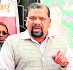 Trivendra Singh Panwar, president of the Uttarakhand Kranti Dal (P), addresses the media in Dehradun on Thursday. A Tribune photograph