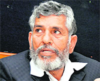 President of the Uttarakhand Kranti Dal (D) Diwakar Bhatt addresses mediapersons