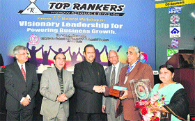 Er DK Gupta (second from right) and his wife receive an award from Subodh Kant Sahai (third from left), Cabinet Tourism Minister, in New Delhi. 
