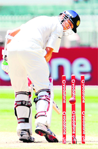 Dravid being bowled by Pattinson in Melbourne on Thursday. Indian batting collapsed for 169