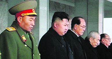 North Koreas Kim Jong-un (2nd left) attends a memorial service for Kim Jong-il in Pyongyang on Thursday.